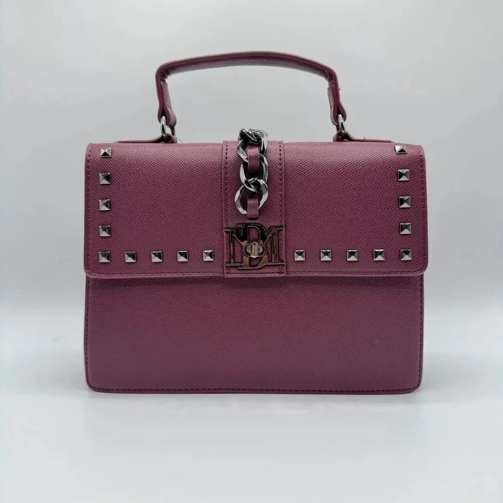 badgley mischka plum crossbody with big chain studs on the cover letter lock